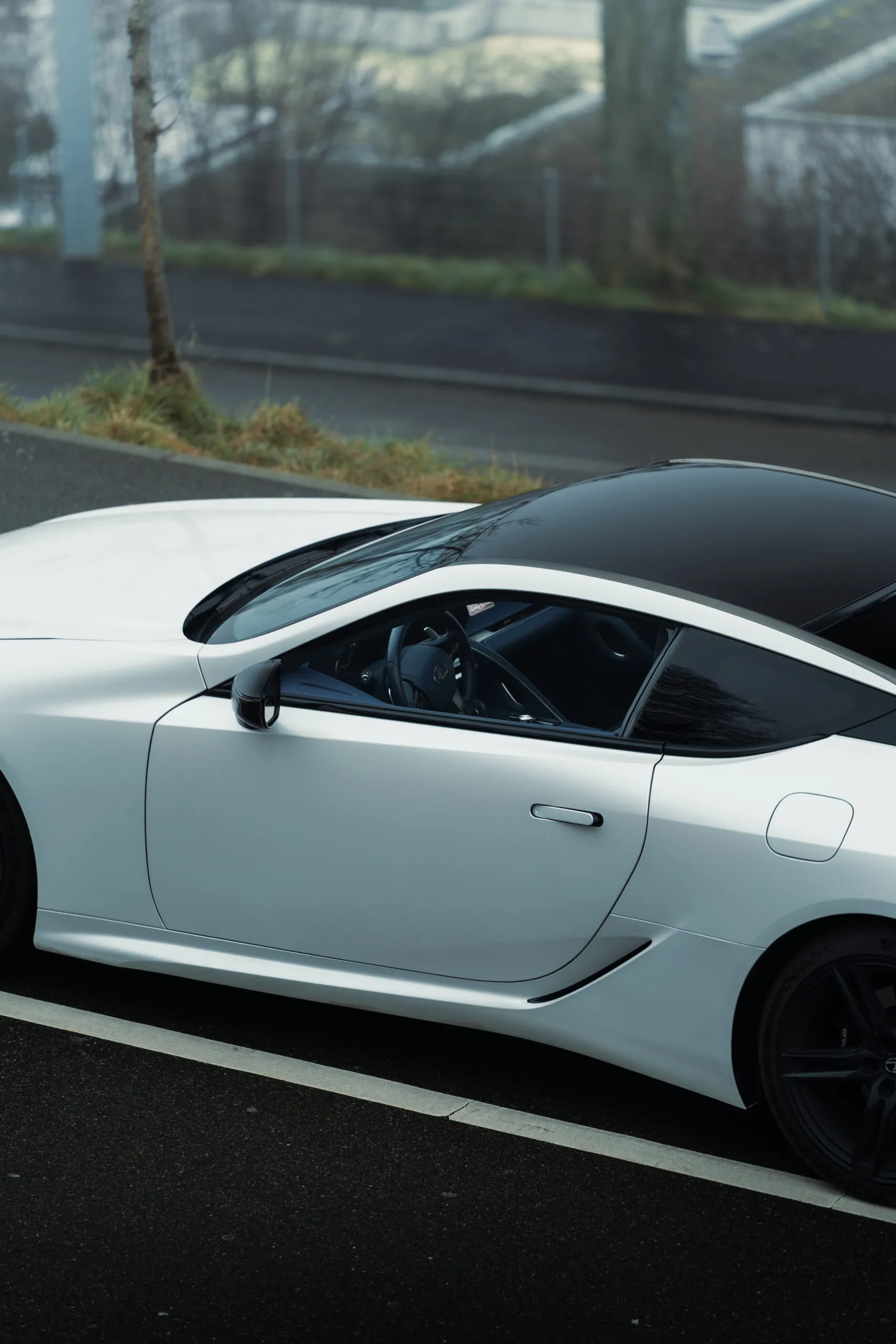 A foggy day in Zurich, Switzerland with a Lexus LC500 Ultimate Edition in the foreground