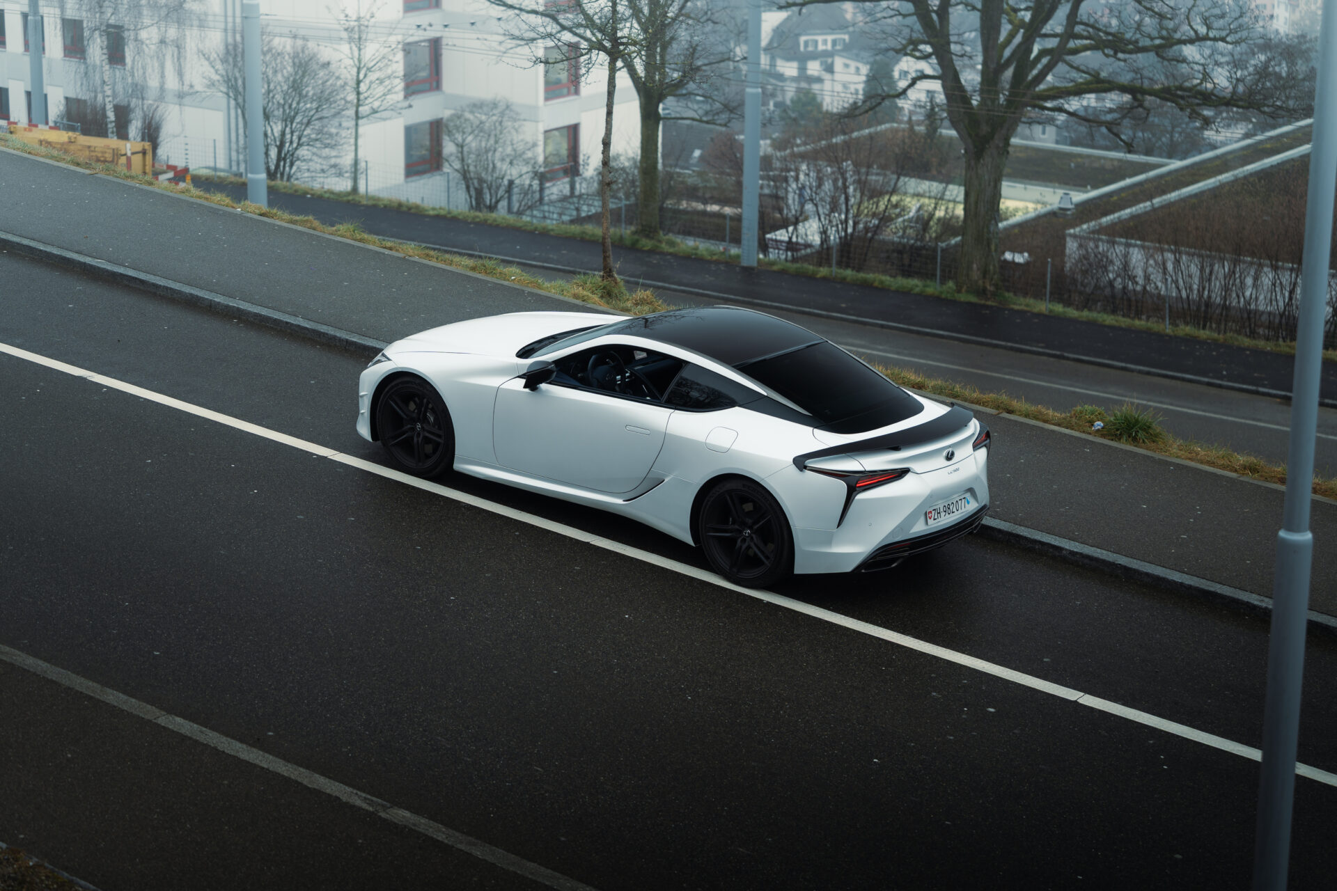 A foggy day in Zurich, Switzerland with a Lexus LC500 Ultimate Edition in the foreground