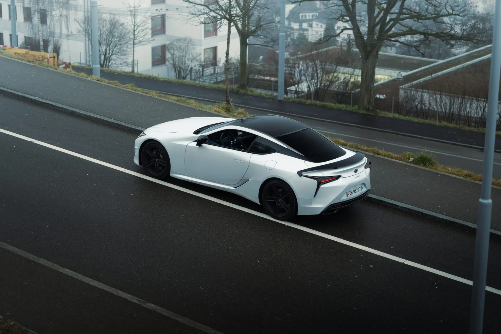 A foggy day in Zurich, Switzerland with a Lexus LC500 Ultimate Edition in the foreground