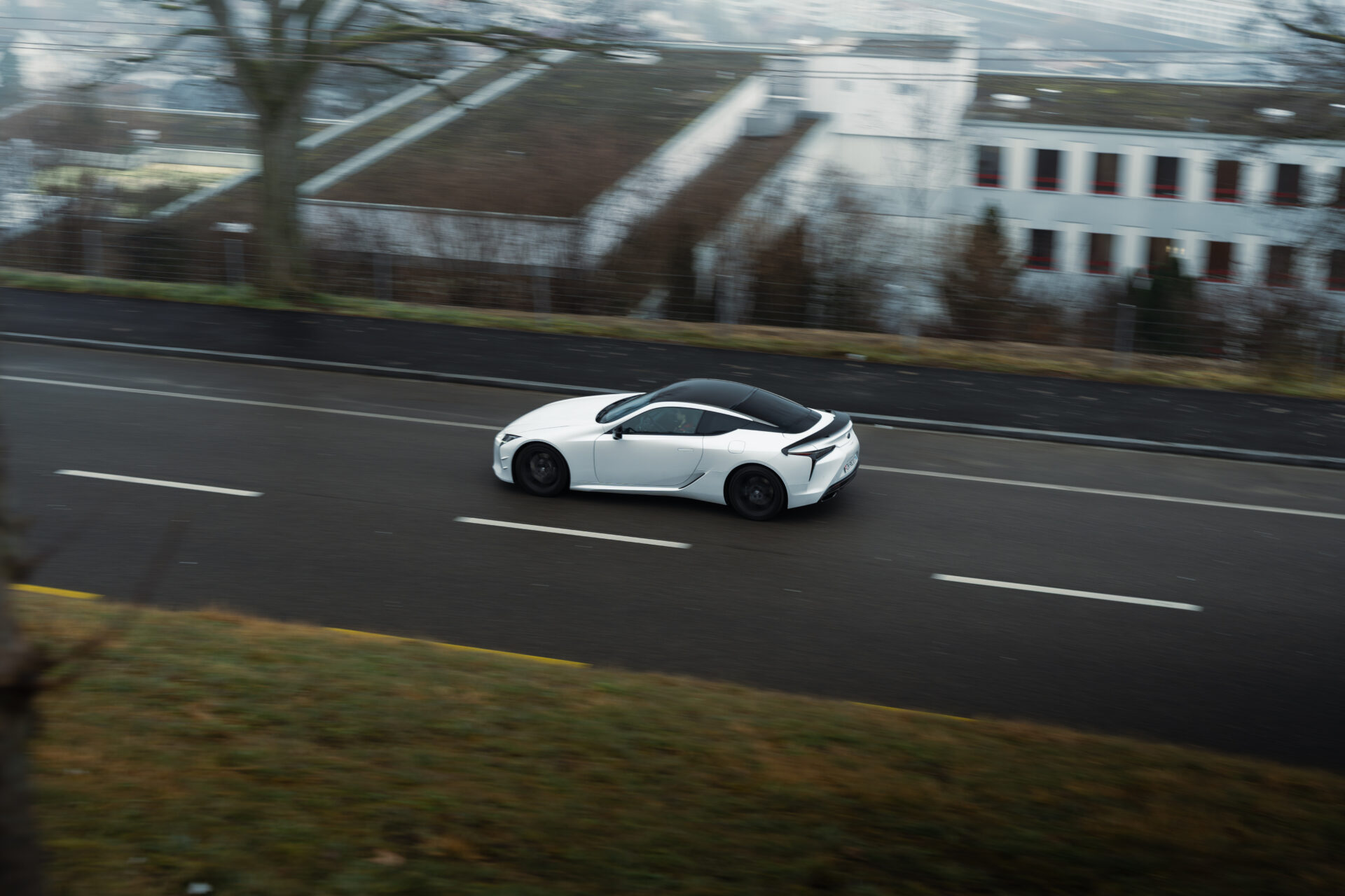 Rolling shot of a Lexus LC500 Ultimate Edition in action